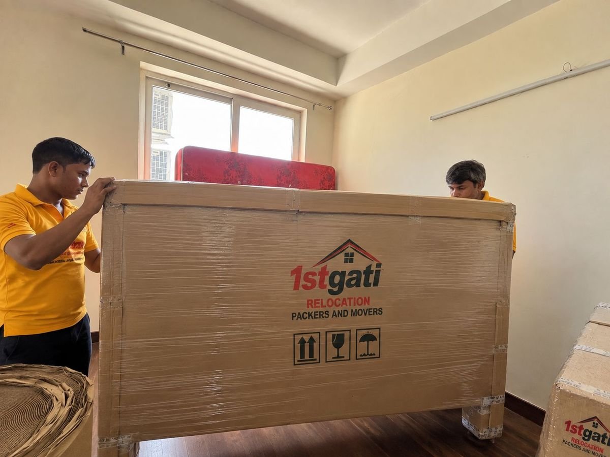Team carefully lifting and carrying heavy furniture